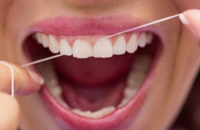usar fio dental Dentista