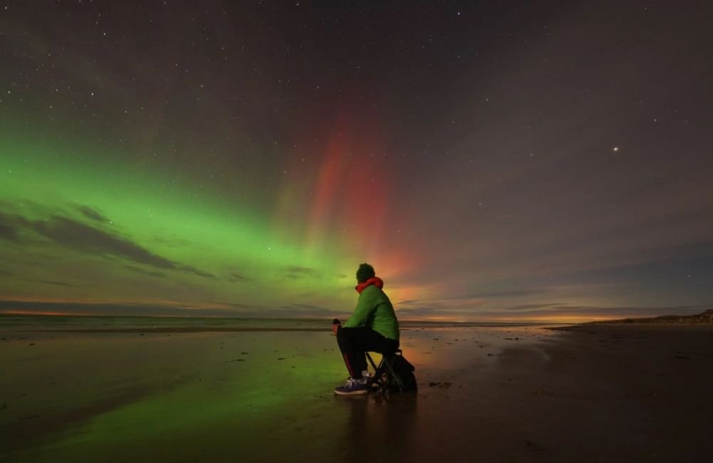 Conheça o guia turístico goiano que viralizou após presenciar rara Aurora Boreal vermelha